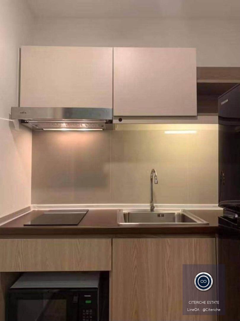 Private Living with Sky Train Views | Brown Condo Phaholyothin 67 | 1-Bedroom Condo